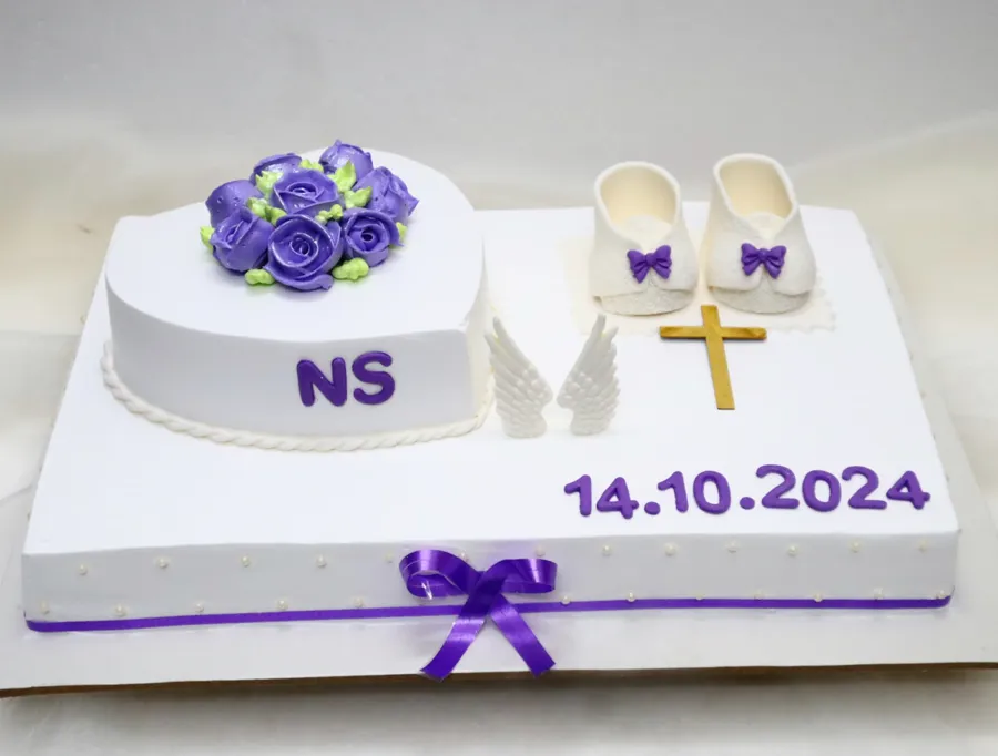 Baptism cake with fondant baby shoes and purple roses