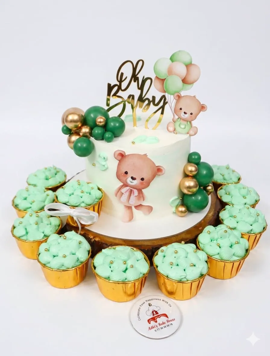 Teddy bear baby shower cake with green cupcakes