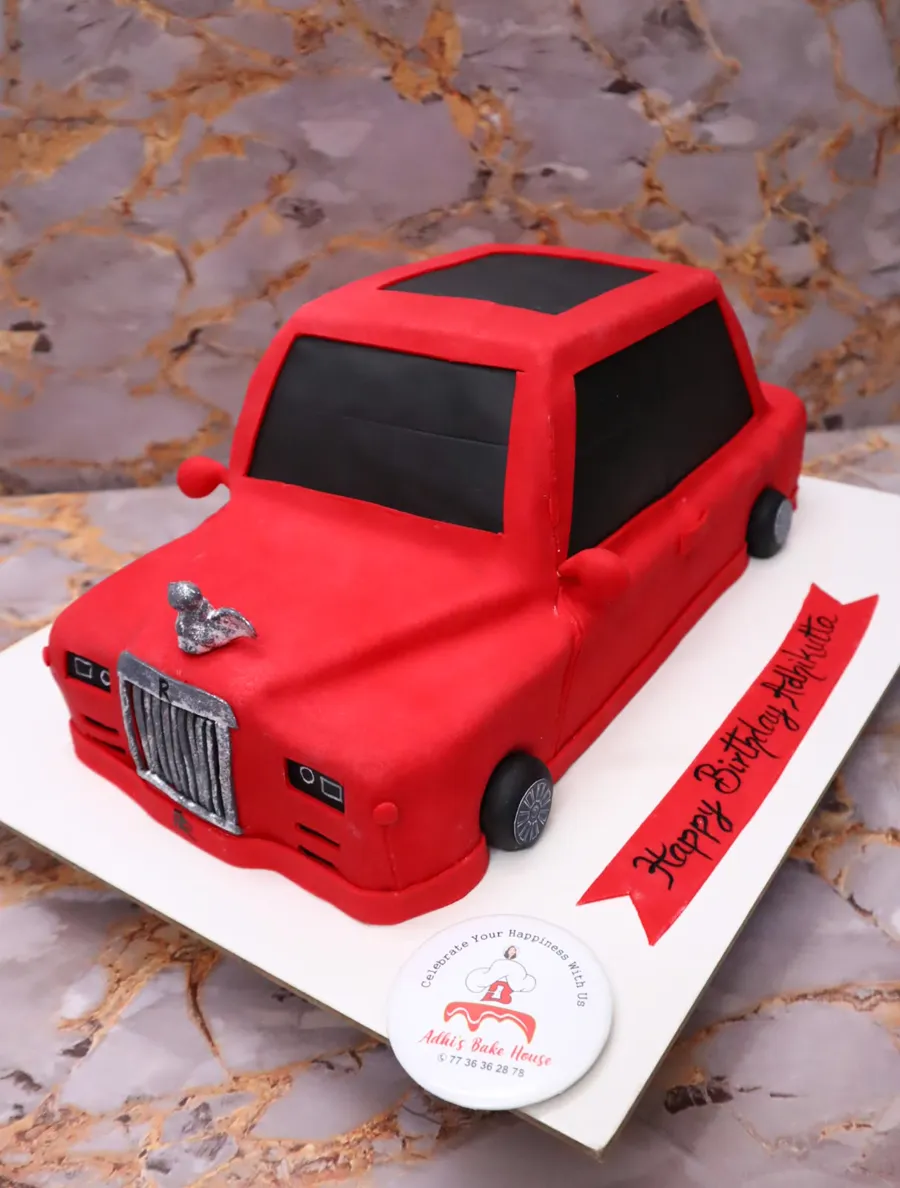Sculpted red vintage car cake