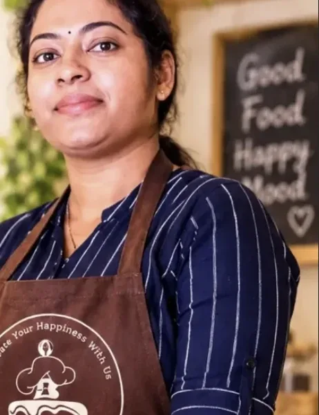 Athira Anoop, founder of Adhi's Bake House, in the bakery kitchen